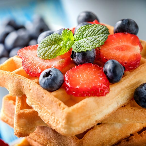 Waffles with berries. Selective focus
